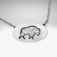 Roam Free Necklace featuring a buffalo design on a silver chain, perfect for nature lovers.