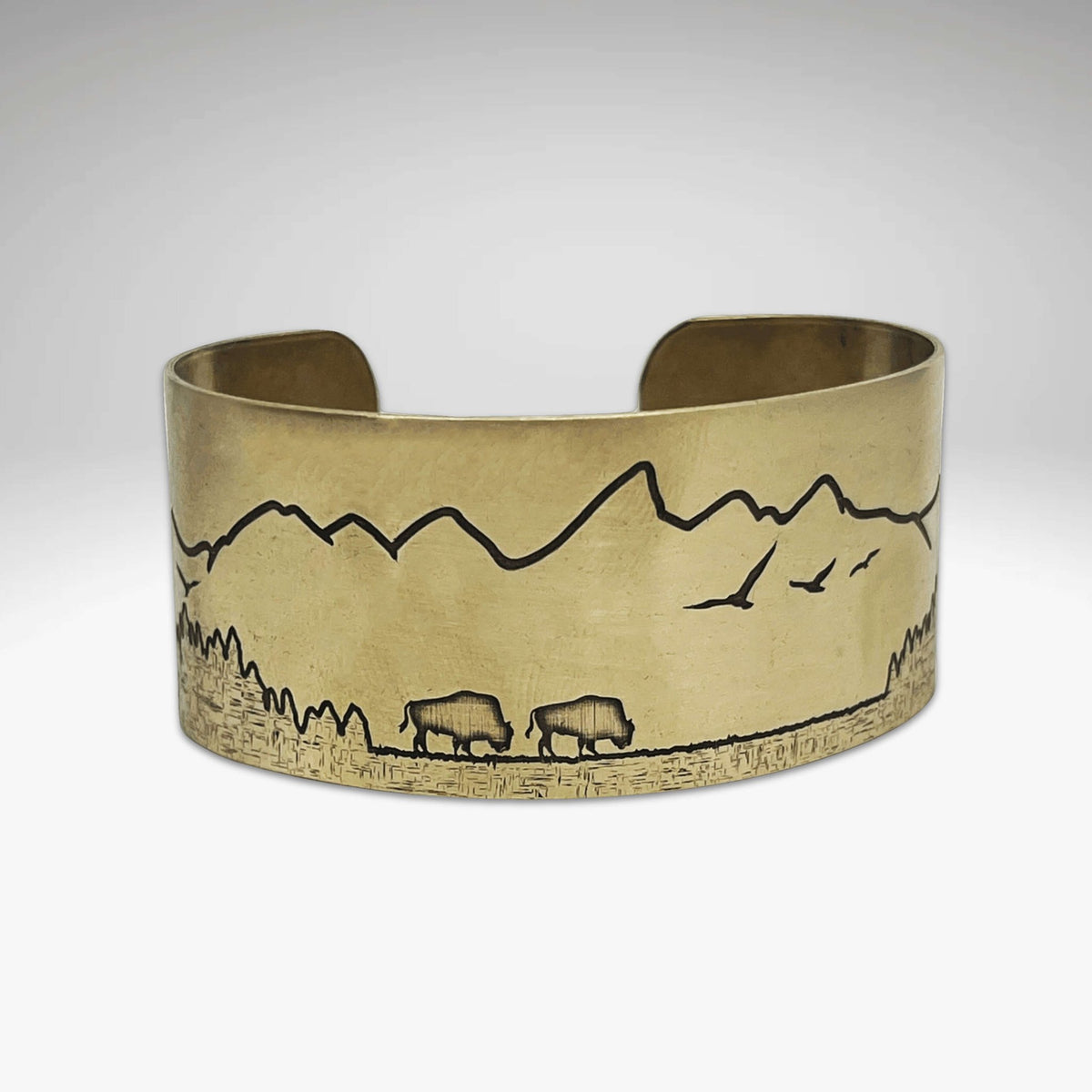 Roaming Buff on the Range Cuff Bracelet showcasing bison silhouette against a mountain backdrop.