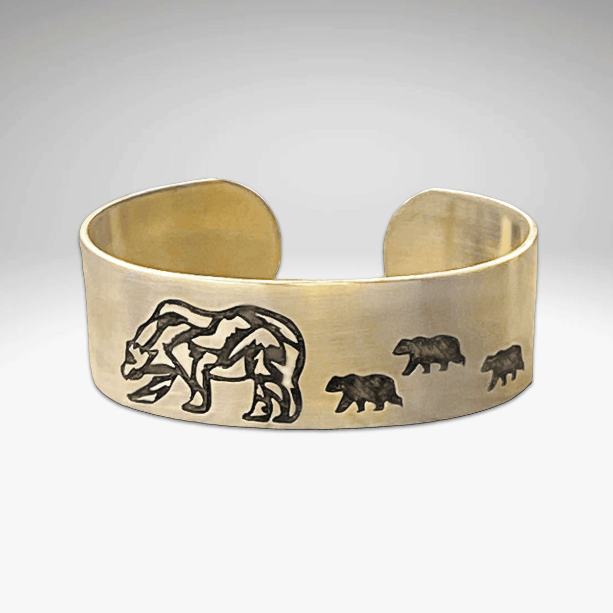 Rocky and Cubs Cuff Bracelet featuring intricate bear designs, perfect for wildlife lovers and outdoor enthusiasts.