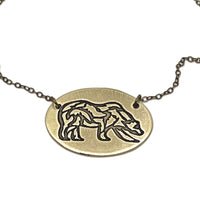 Rocky Bear Necklace featuring a bronze grizzly bear pendant, symbolizing strength, courage, and connection to loved ones.