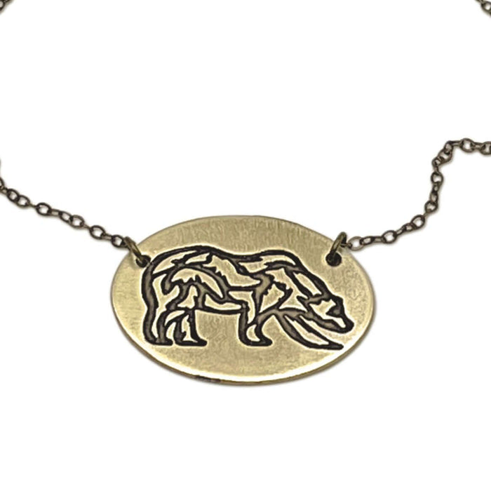 Rocky Bear Necklace featuring a bronze grizzly bear pendant, symbolizing strength, courage, and connection to loved ones.
