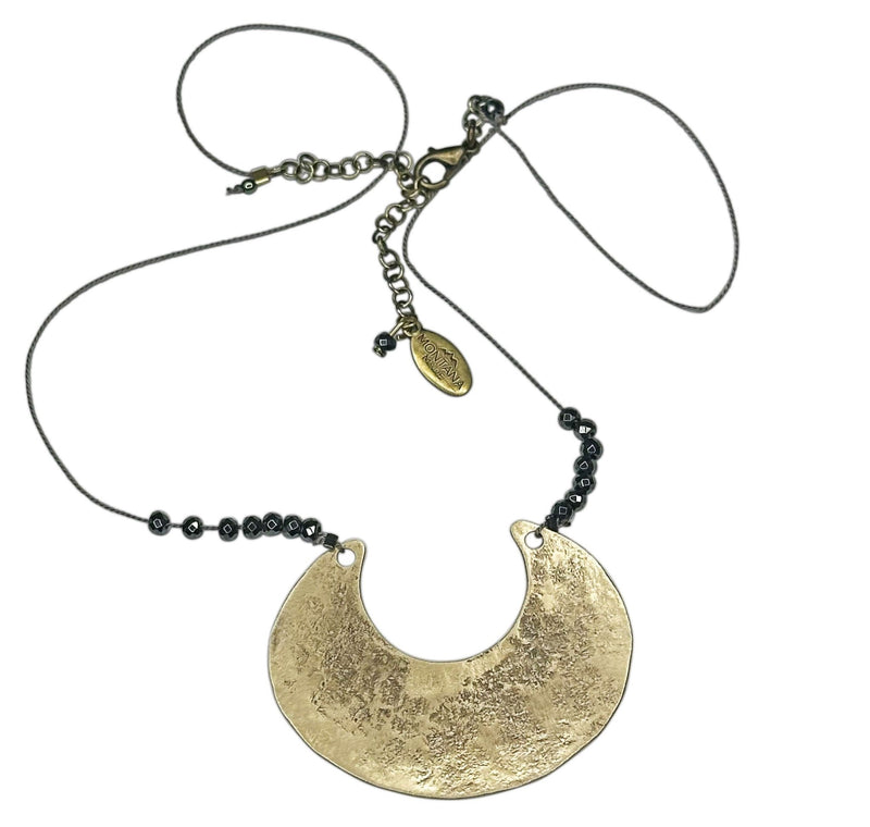 Scoop Necklace featuring a large geometric pendant on a delicate silk cord with hematite beads, adjustable from 16" to 18".