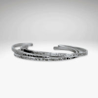 Set of Three Thin Cuff Bracelets in Matte Silver finish with a textured hammered design.