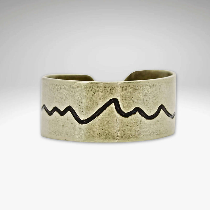 Simple Mountain Adjustable Ring featuring mountain-inspired design and handmade raw brass craftsmanship.