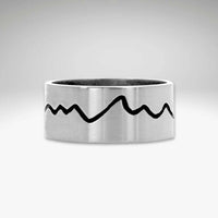 Simple Mountain Ring showcasing a minimalist mountain design on a sleek silver band.