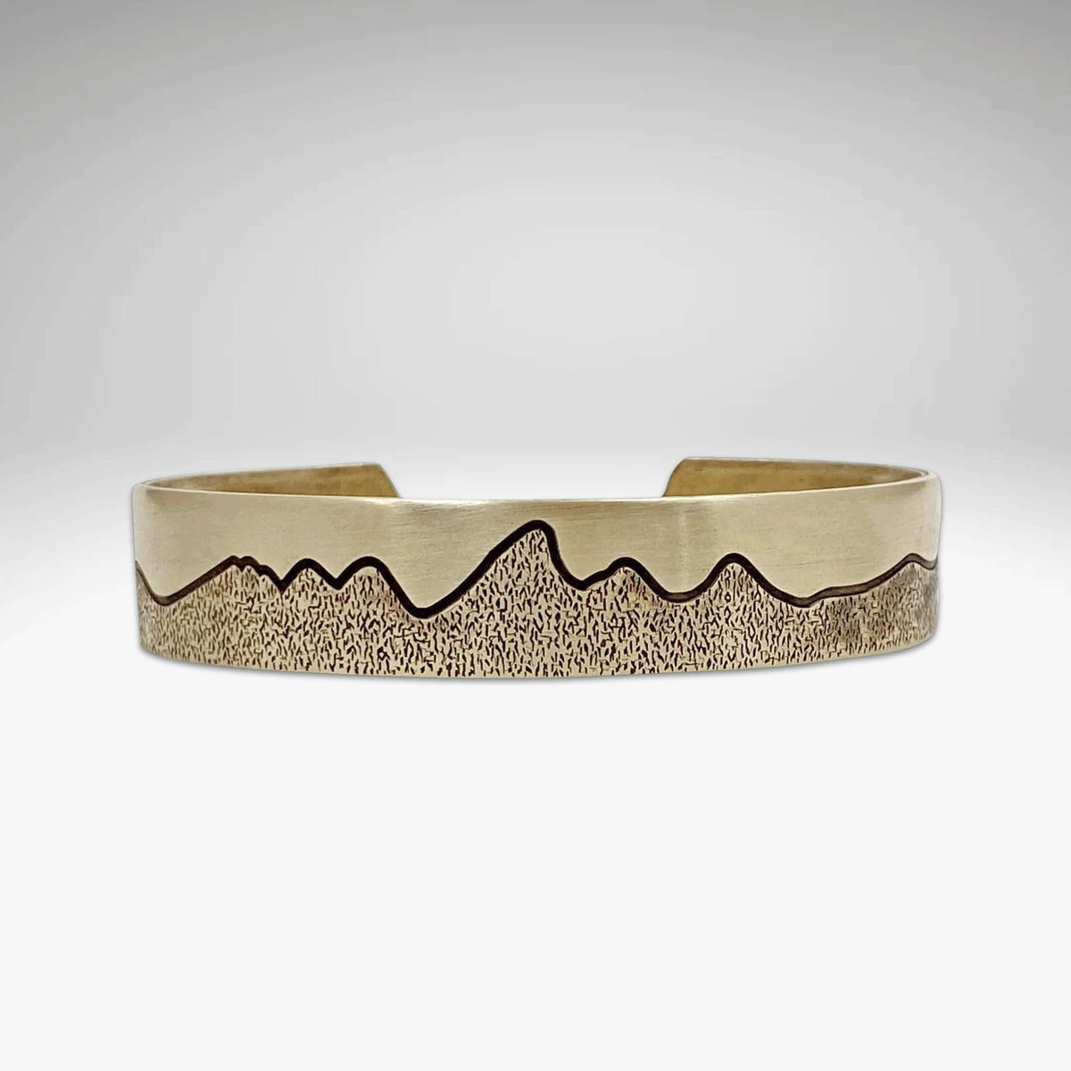 Simple Tetons Cuff Bracelet featuring a unique mountain etching design, perfect for outdoor enthusiasts.