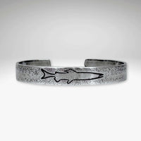 Single Trout Cuff Bracelet featuring a sleek design with a trout engraving on a silver cuff.