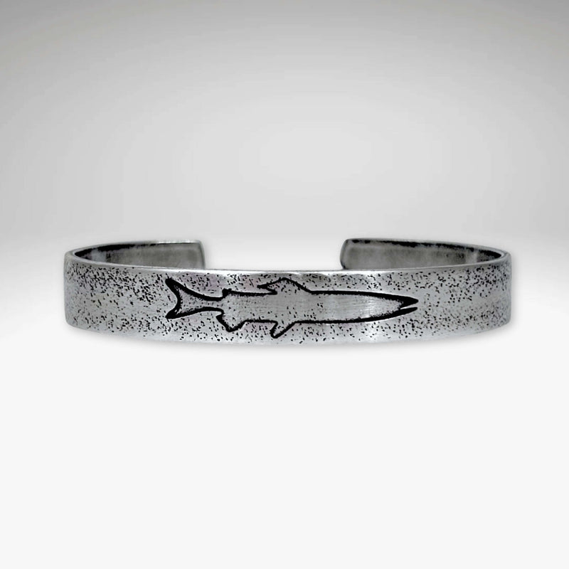 Single Trout Cuff Bracelet featuring a sleek design with a trout engraving on a silver cuff.