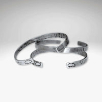 Skinny Buff Cuff Bracelet collection featuring unique bison designs and a sleek finish.