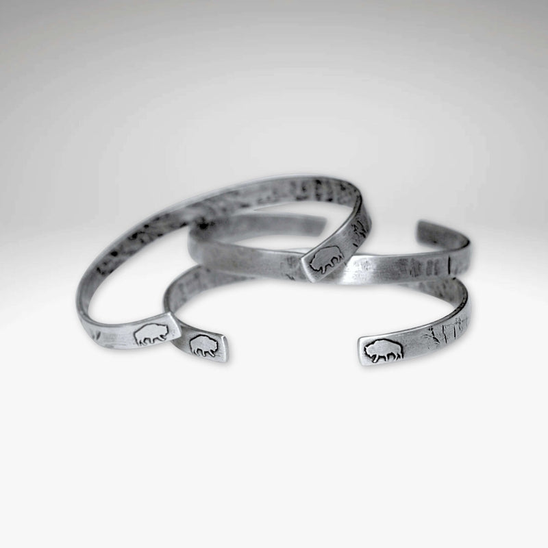 Skinny Buff Cuff Bracelet collection featuring unique bison designs and a sleek finish.