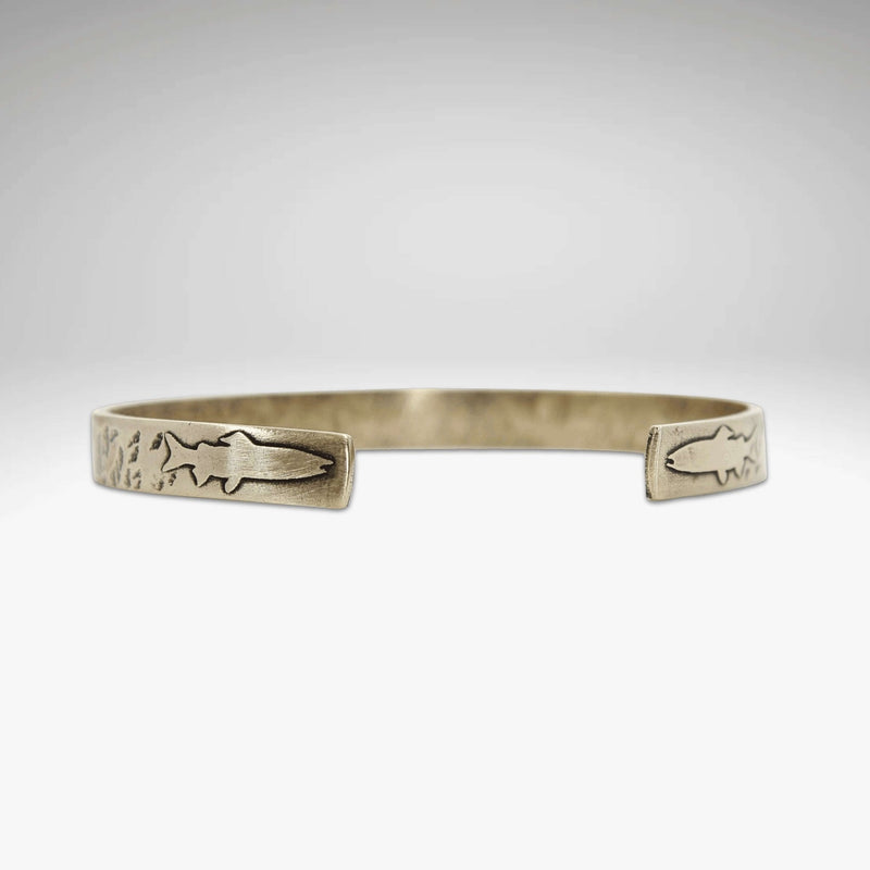 Skinny Fish Cuff Bracelet featuring etched fish design on raw brass, stylish statement for wildlife lovers.