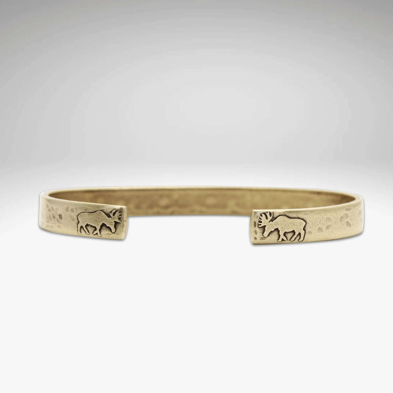 Skinny Moose Cuff Bracelet featuring moose designs on the tips, made of raw brass, perfect gift for moose lovers.