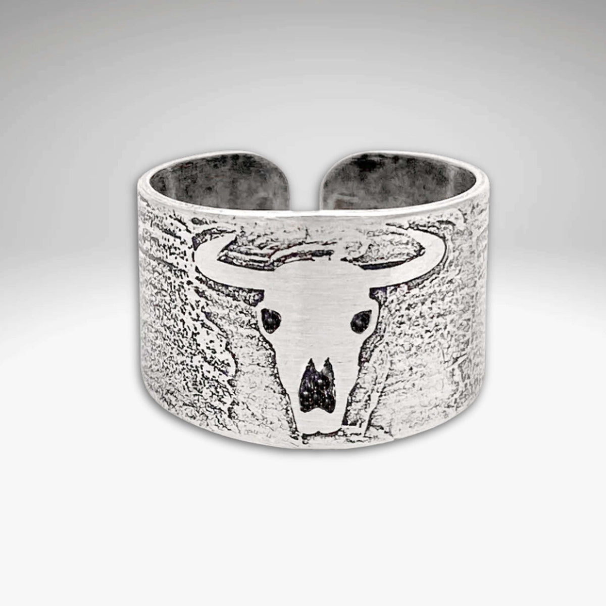Skull Adjustable Ring featuring bull skull design in matte silver finish, perfect for adventurous spirit.