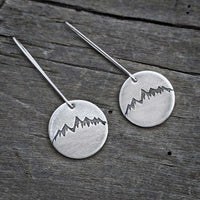 Snowcap Mountain Earrings featuring snowcapped mountain peaks on elegant round disks with kidney earwires.