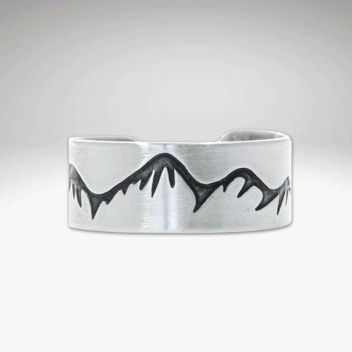 Snowcaps Adjustable Ring featuring etched mountain design in Matte Silver finish.