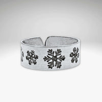 Snowfall Adjustable Ring featuring unique etched snowflakes in Matte Silver finish.