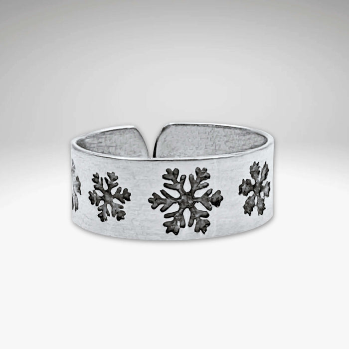 Snowfall Adjustable Ring featuring unique etched snowflakes in Matte Silver finish.
