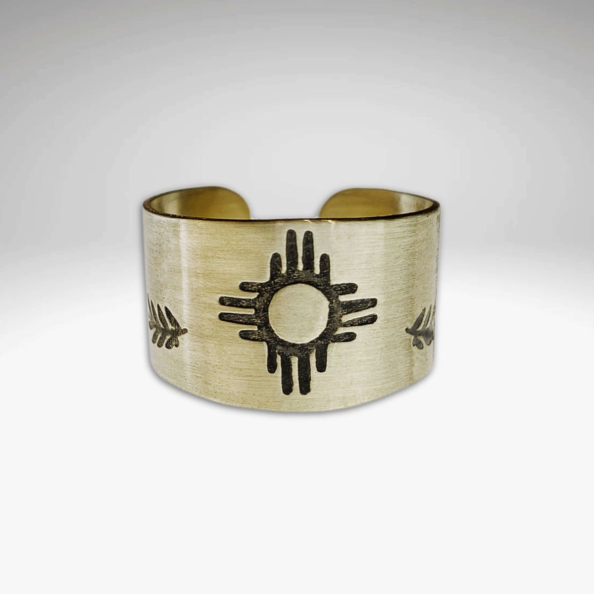 Sol Adjustable Ring featuring Zia sun design, made of raw brass with a unique etching process.