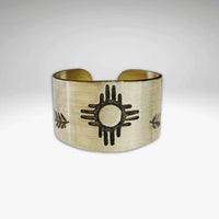Sol Adjustable Ring featuring Zia sun design, made of raw brass with a unique etching process.