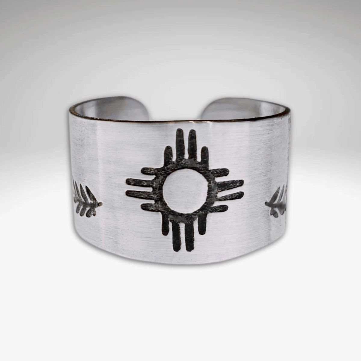 Sol Adjustable Ring featuring Zia sun design in shiny silver finish, tapered style for a perfect fit.