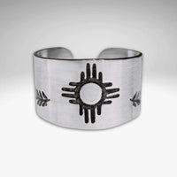 Sol Adjustable Ring featuring Zia sun design in shiny silver finish, tapered style for a perfect fit.