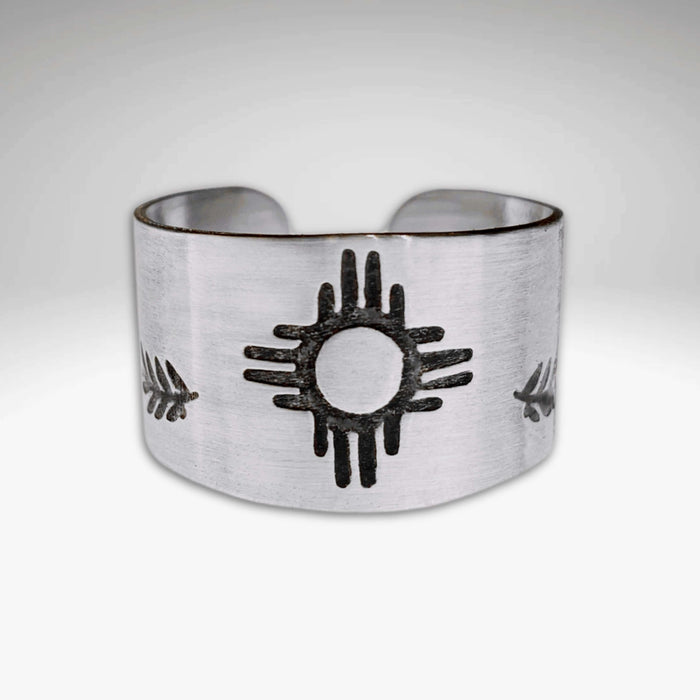 Sol Adjustable Ring featuring Zia sun design in shiny silver finish, tapered style for a perfect fit.