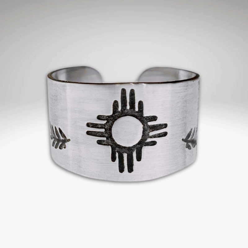Sol Adjustable Ring featuring Zia sun design in shiny silver finish, tapered style for a perfect fit.