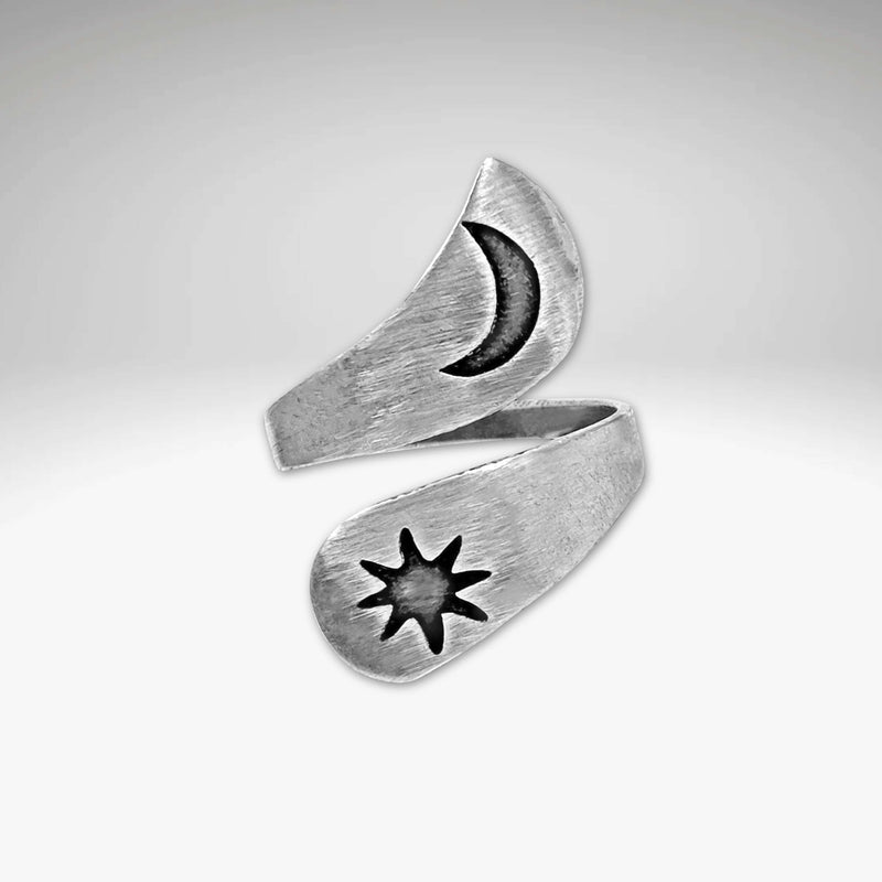 Solar Adjustable Ring featuring a sun and crescent moon design in matte silver finish.