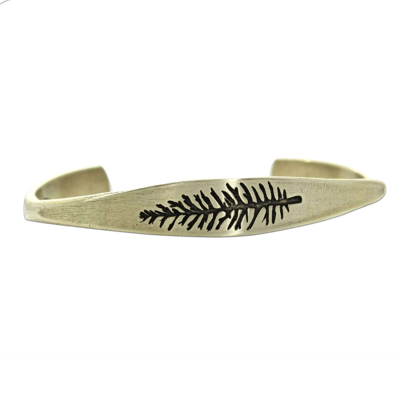 Spruce Signet Cuff Bracelet featuring a detailed spruce outline etching, perfect for adding a touch of nature.