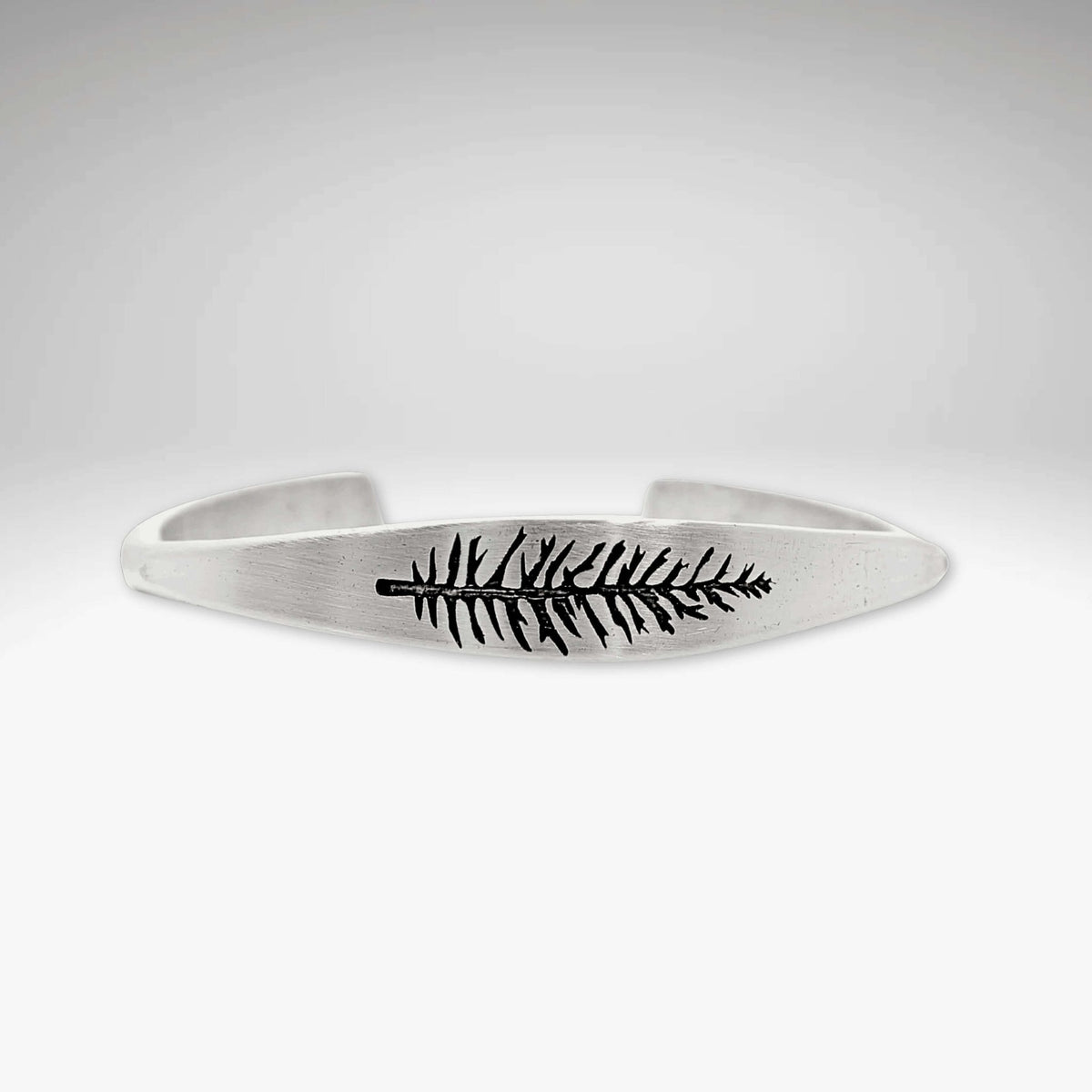 Spruce Signet Cuff Bracelet featuring a unique spruce outline etching, stylish and adjustable for any occasion.