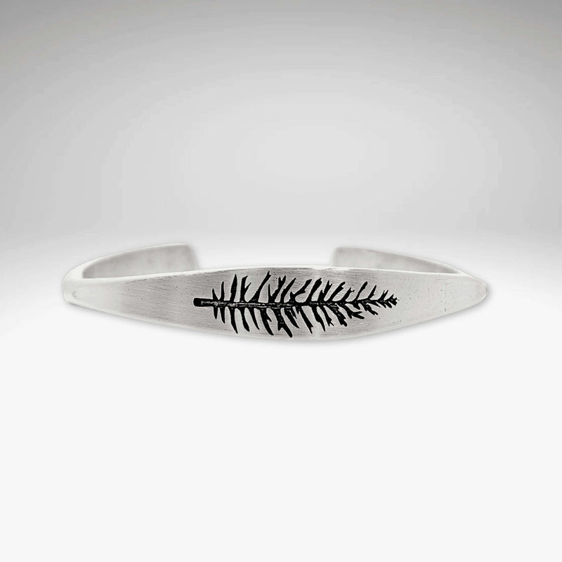 Spruce Signet Cuff Bracelet featuring a unique spruce outline etching, stylish and adjustable for any occasion.