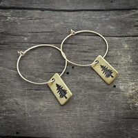 Spruce Tree Hoop Earrings with antique brass finish hanging on simple hoops, perfect for forest lovers.