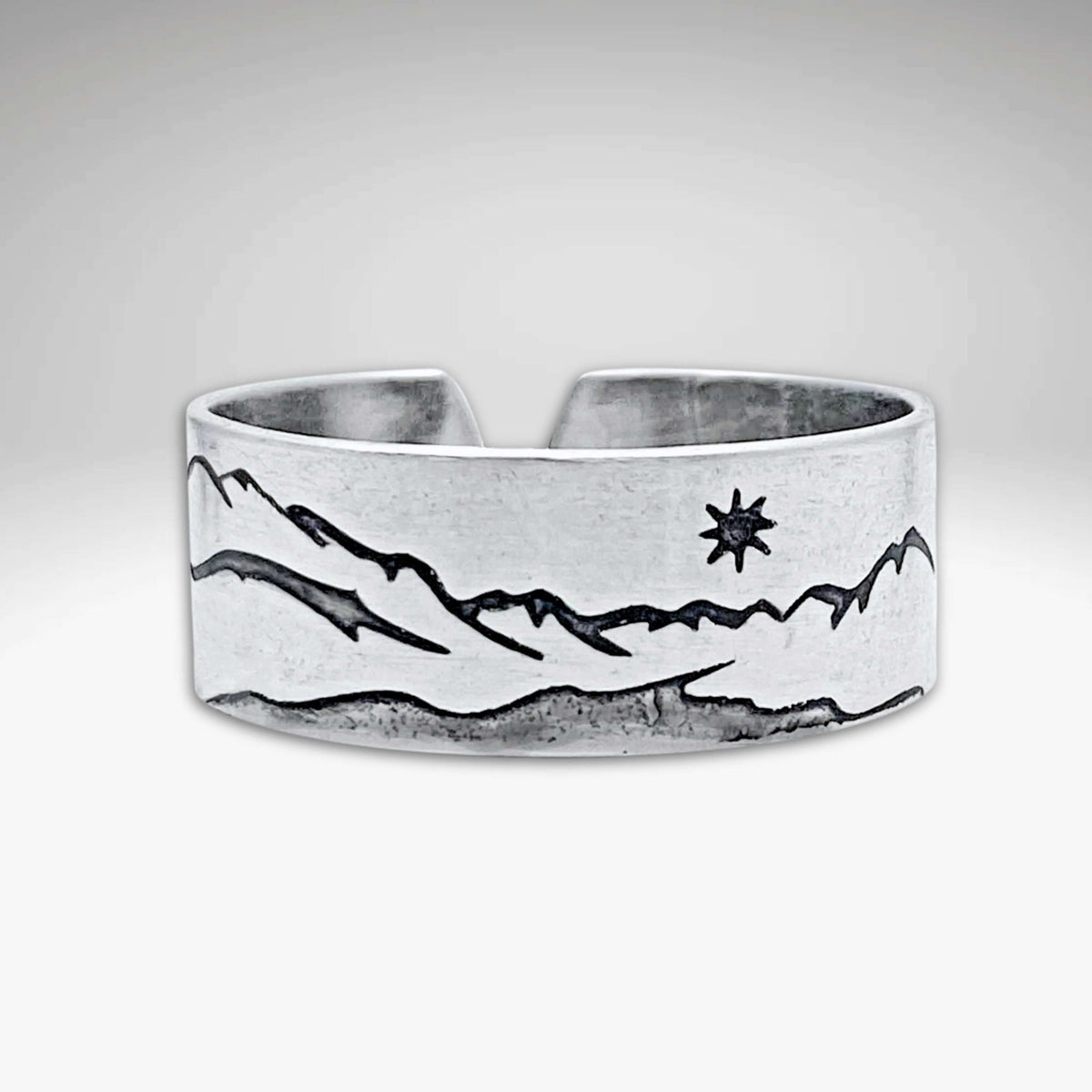 St. Mary Lake Adjustable Ring featuring mountain designs in Matte Silver finish.
