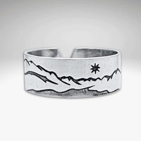 St. Mary Lake Adjustable Ring featuring mountain designs in Matte Silver finish.