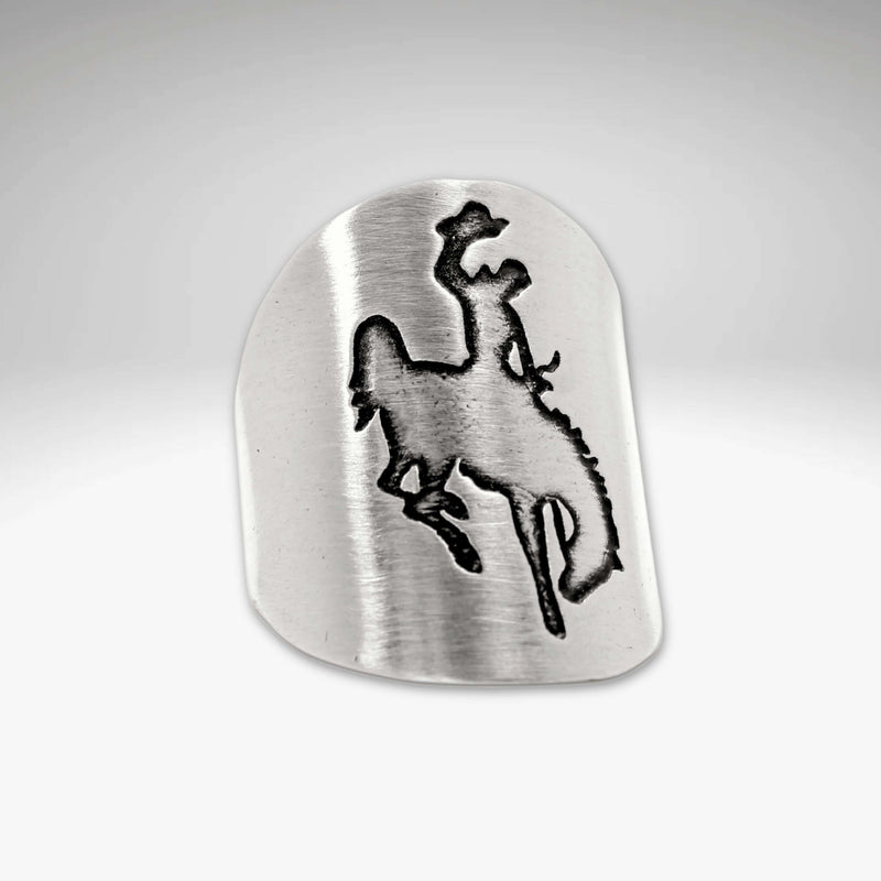 Steamboat Adjustable Ring featuring a bronco rider design etched in brass.