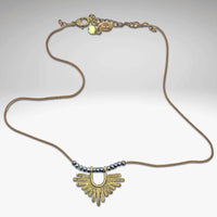 Sunbeam Necklace featuring a geometric pendant and small hematite beads on a delicate silk cord.