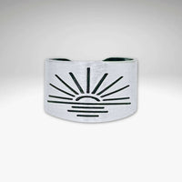 Sunrise Adjustable Ring in matte silver finish with sunburst design, showcasing handcrafted details.