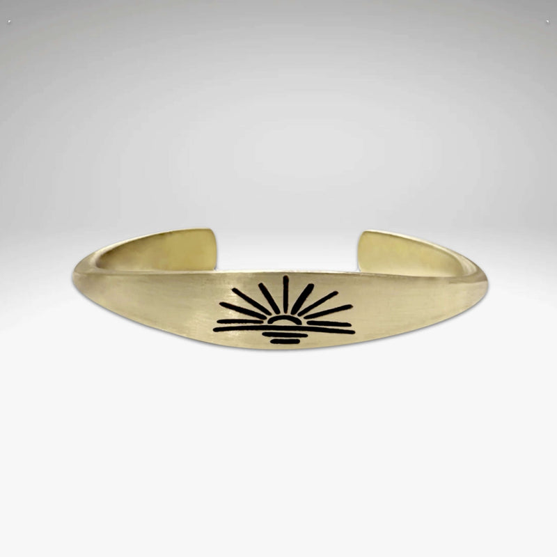 Sunrise Signet Cuff in antique brass with sun motif, handmade in Montana, adjustable, nickel, lead and cadmium free.