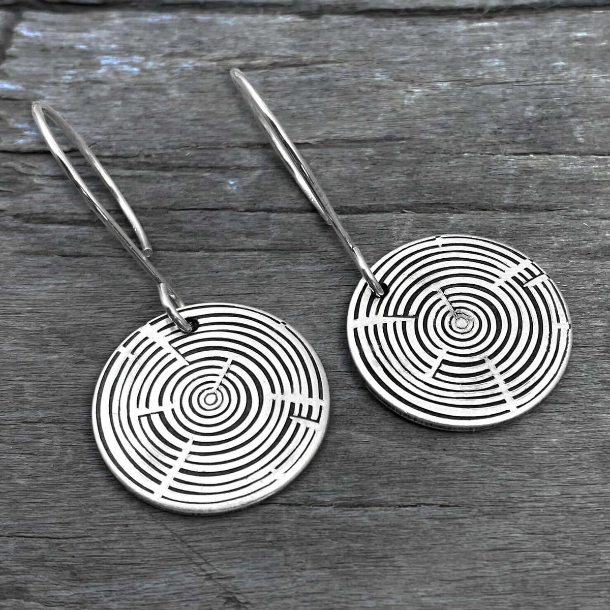 Timber Earrings- Tree Rings featuring etched silver discs with a unique tree ring design.