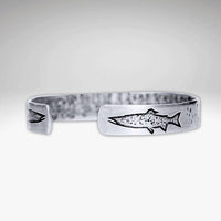 Trout on Tips Cuff Bracelet featuring an etched trout design, handmade and adjustable for both men and women.