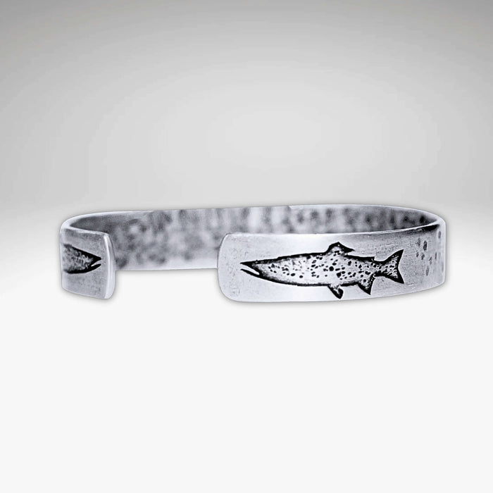 Trout on Tips Cuff Bracelet featuring an etched trout design, handmade and adjustable for both men and women.