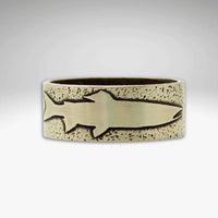 Handmade Trout Ring featuring an etched trout design on a textured background in raw brass.