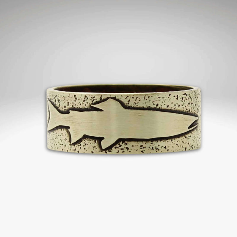 Handmade Trout Ring featuring an etched trout design on a textured background in raw brass.