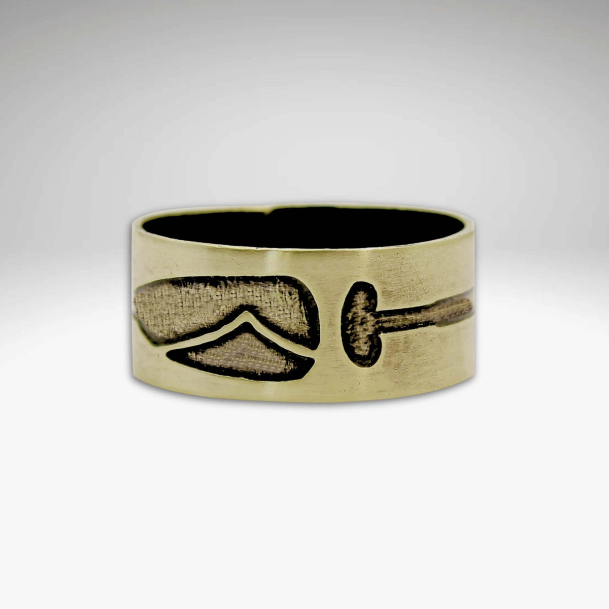 Upstream Adjustable Ring featuring a paddle design etched on raw brass, perfect for outdoor enthusiasts.