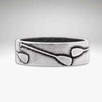 Upstream Paddle Ring with paddle design, perfect for water lovers and outdoor enthusiasts.