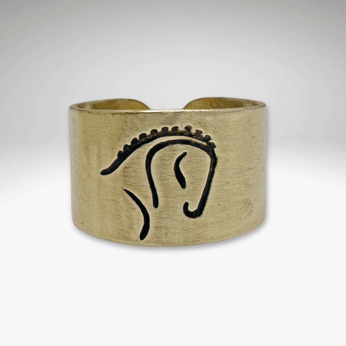 White Horse Adjustable Ring in Antique Brass showcasing a powerful dressage horse silhouette.