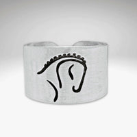 White Horse Adjustable Ring featuring a striking silhouette of a dressage horse in Matte Silver finish.