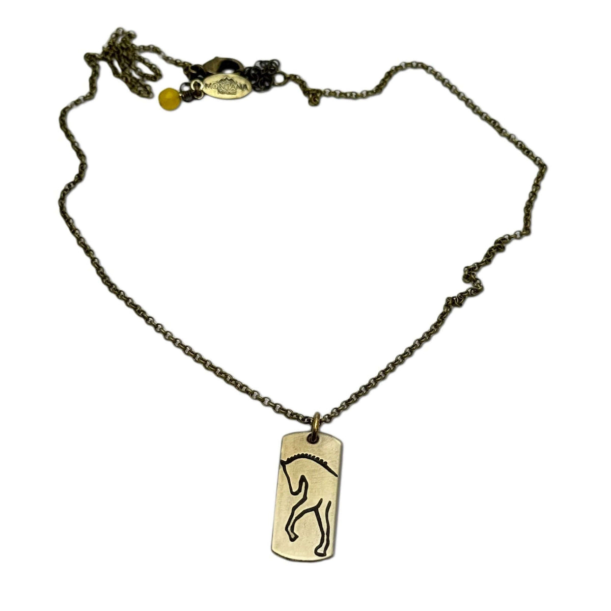 White Horse Necklace featuring a brass horse silhouette on a delicate chain, perfect for horse lovers.