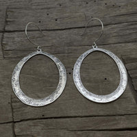 Wide Open Earrings in Matte Silver finish with hammered texture and elegant oval design.