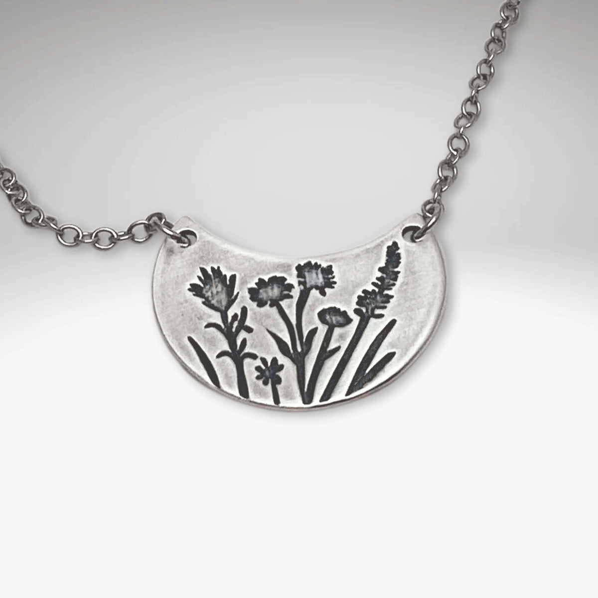 Beautiful Wildflower Basket Necklace featuring intricate floral designs, inspired by spring and summer blooms.